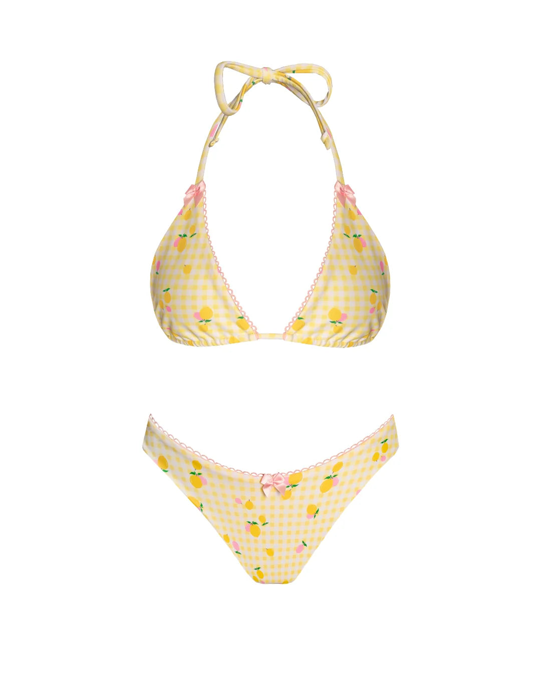This image features a charming high-cut bikini bottom, bathed in a pastel yellow gingham pattern speckled with ditsy pink and yellow lemons. The bottoms are accented with pink lace trim and a playful pink bow at the front, adding a touch of sweetness to the design.