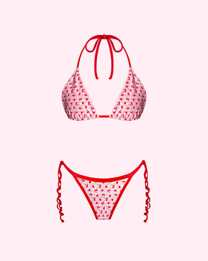 Woman displaying a red bikini triangle top and tie bottoms